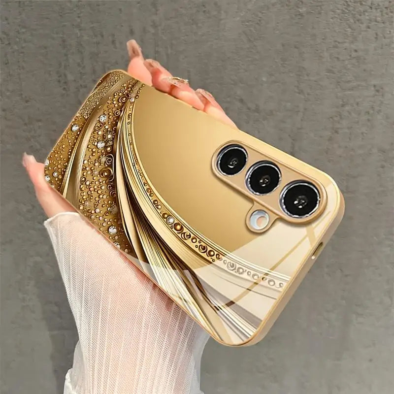 Gold-plated TPU phone case for Samsung Galaxy S26 and S25, featuring a sleek, protective design from Corporación Turística.