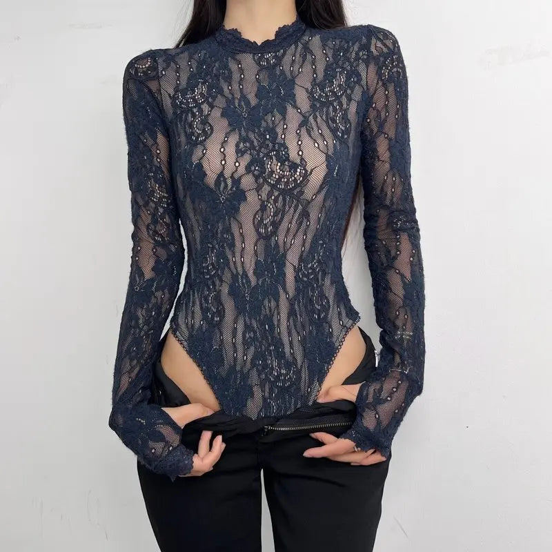 Women's long-sleeve body with high neckline from Corporación Turística, made of soft, fitted fabric in a neutral color.