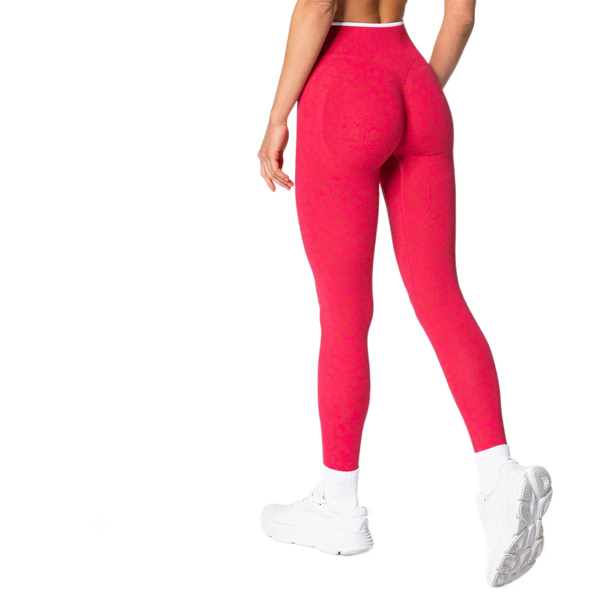 Seamless leggings from Corporación Turística in soft, stretchy fabric, shown on a model highlighting comfort and fit.