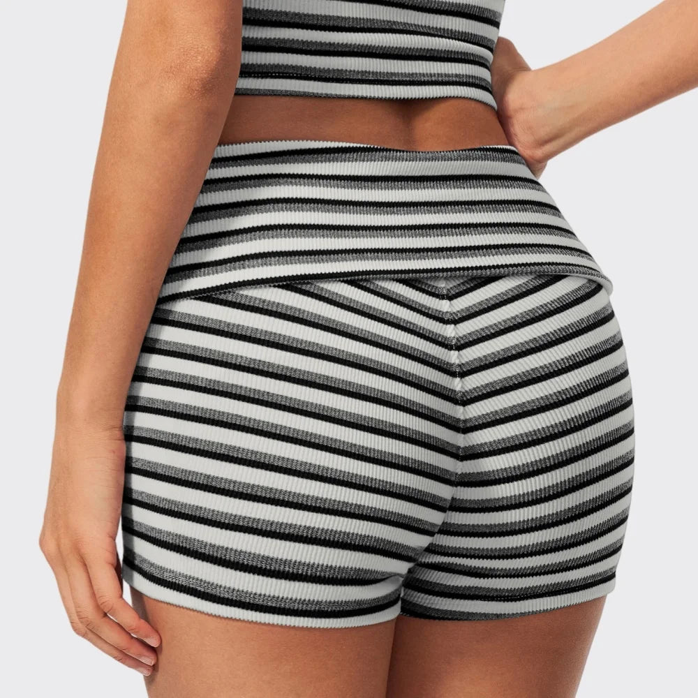 Striped ribbed yoga shorts by Corporación Turística featuring comfortable stretch fabric for active wear.