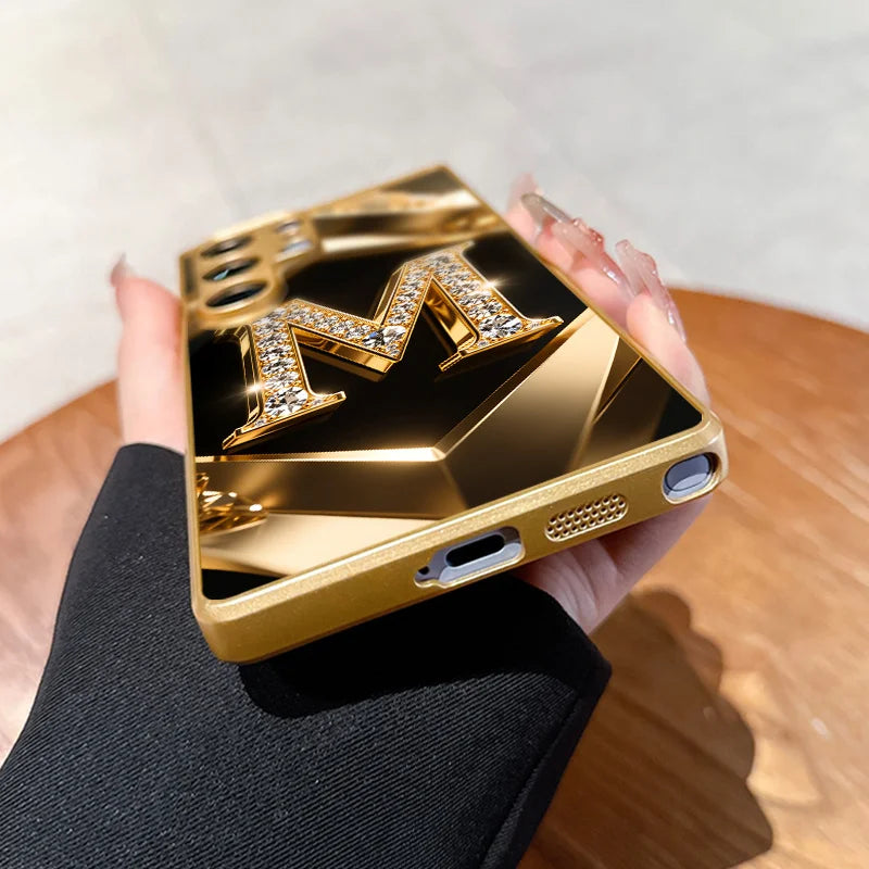 Crystal phone case with gold diamond letter M design, perfect for Samsung Galaxy models, stylish and protective.