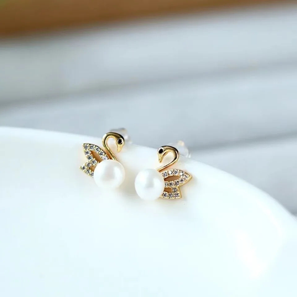 Pendientes de cisne de cristal hueco de aguja de plata 92...