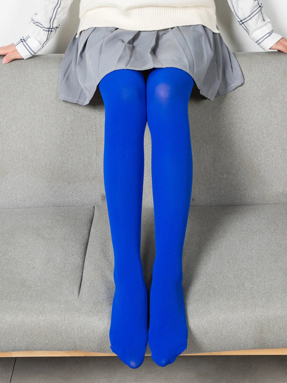 High-elasticity women's tights in pastel colors, 80D, showing smooth fabric and vibrant hues from Corporación Turística.