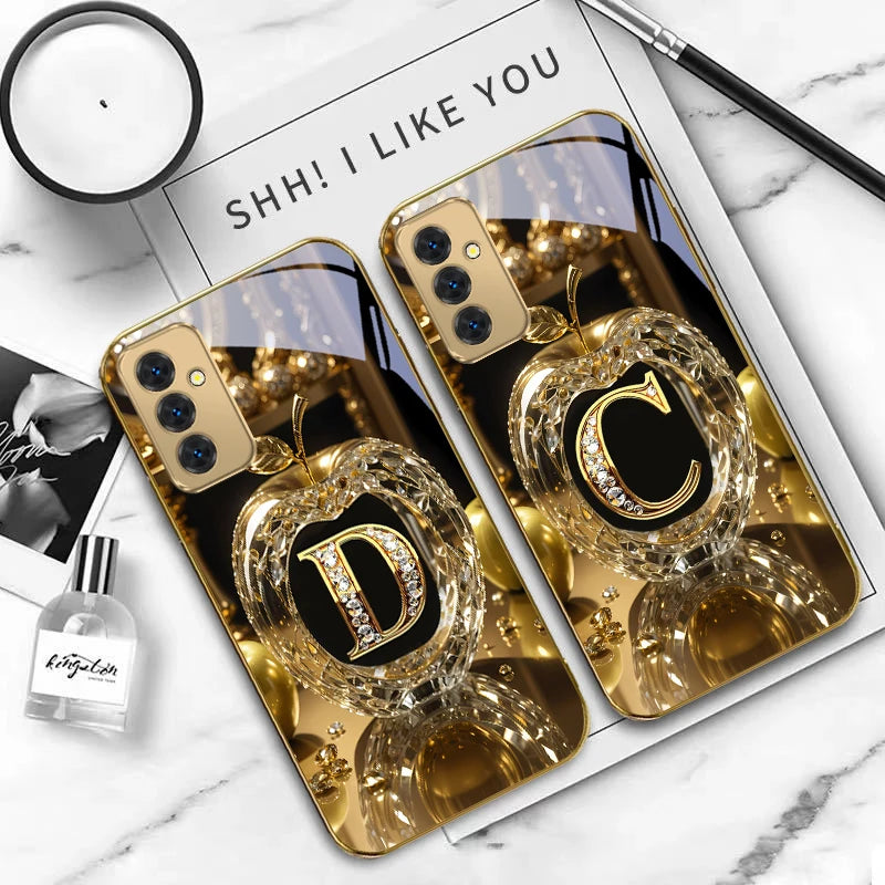 Gold crystal phone case with letter 'A' for Samsung Galaxy S series, featuring sleek transparent design and decorative gold accents.
