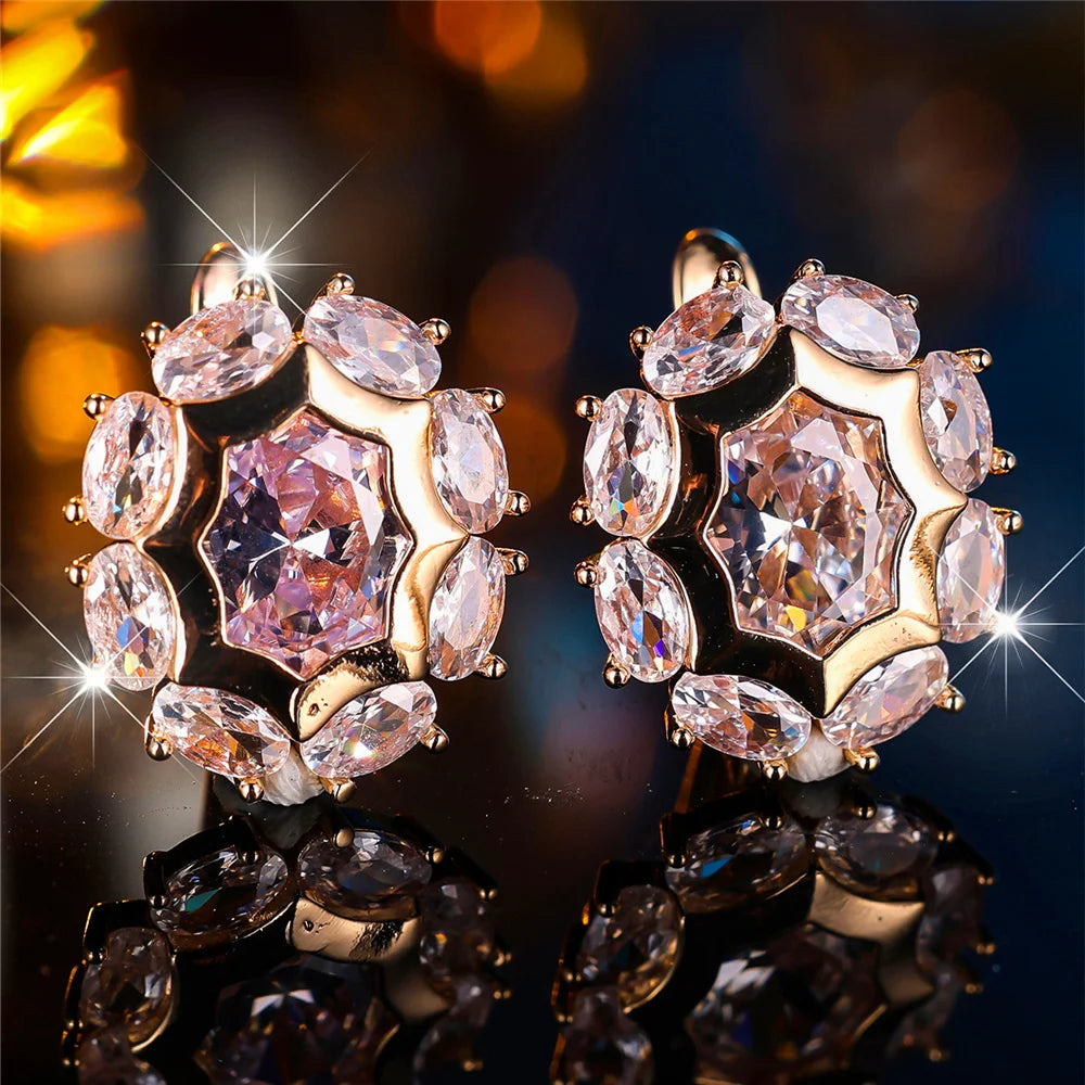 Oval cubic zirconia hoop earrings for women, featuring sparkling stones and silver-tone metal, stylish jewelry by Corporación Turística.