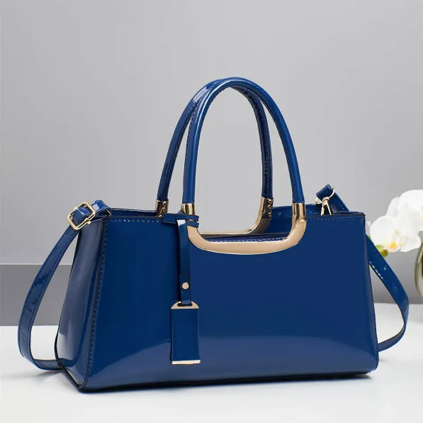 Western-style women's shoulder bag by Corporación Turística, featuring leather details and a spacious design.