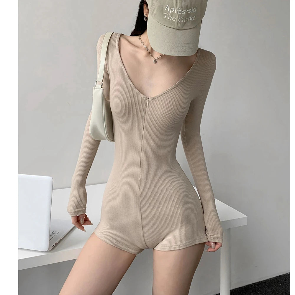 Women's elastic fitted yoga jumpsuit by Corporación Turística, featuring a sleek, comfortable design for active wear.