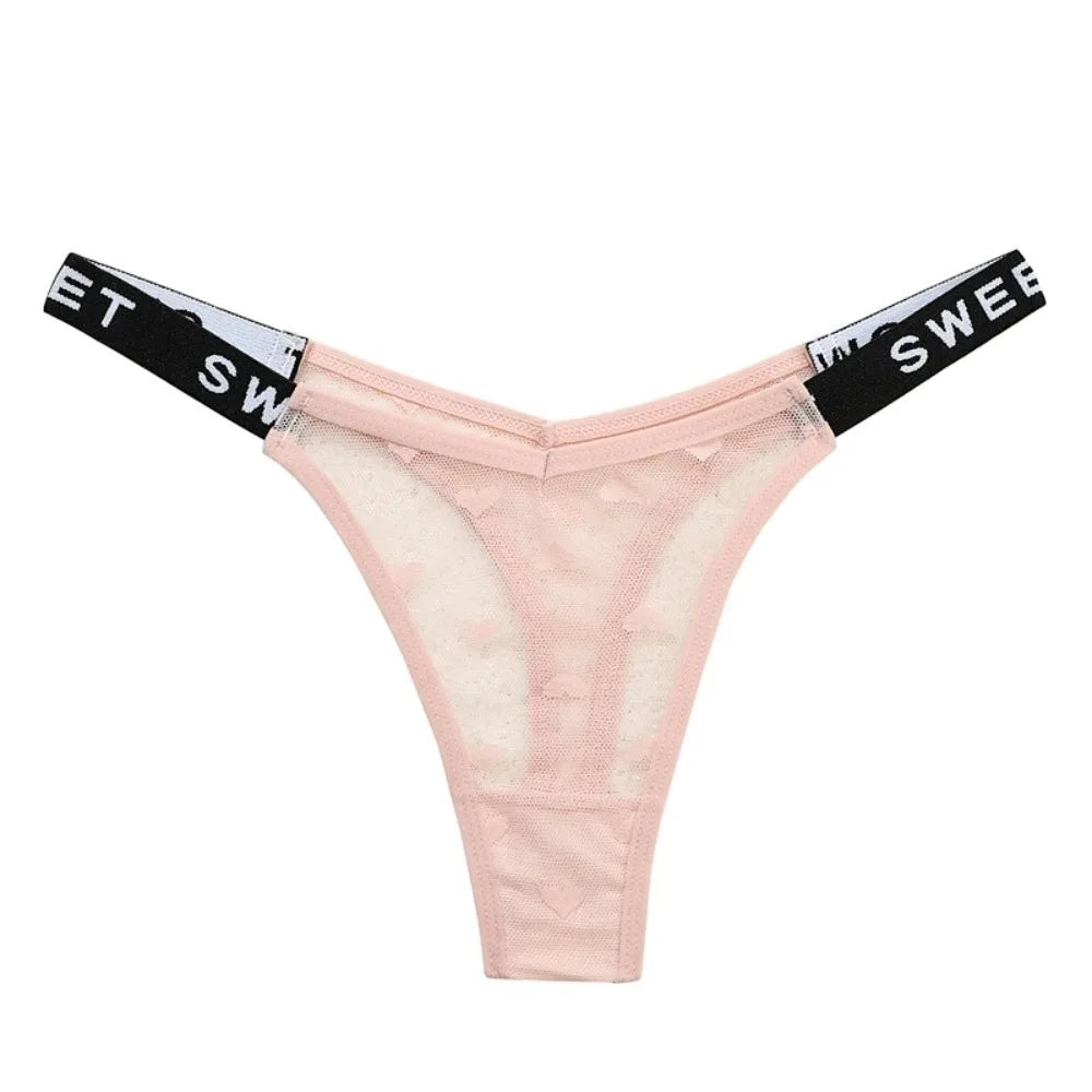 Cotton heart mesh thong by Corporación Turística, seamless design, comfortable women's underwear, close-up of the lingerie fabric.