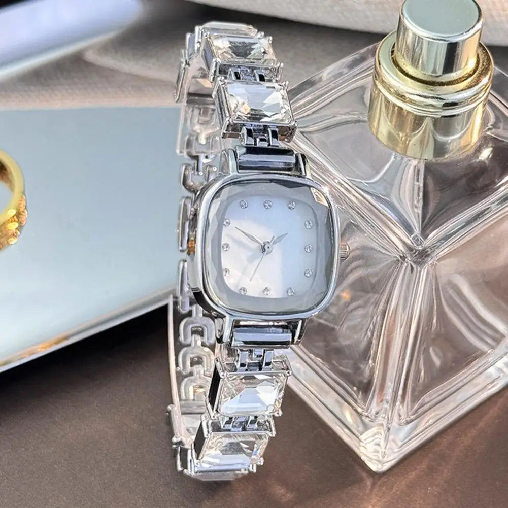 Brillante women's wristwatch with square face from Corporación Turística, featuring a sleek, modern design and elegant details.