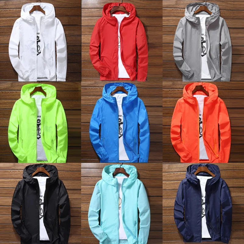 Quick-drying cycling and running jacket by Corporación Turística, lightweight waterproof protector for outdoor sports.