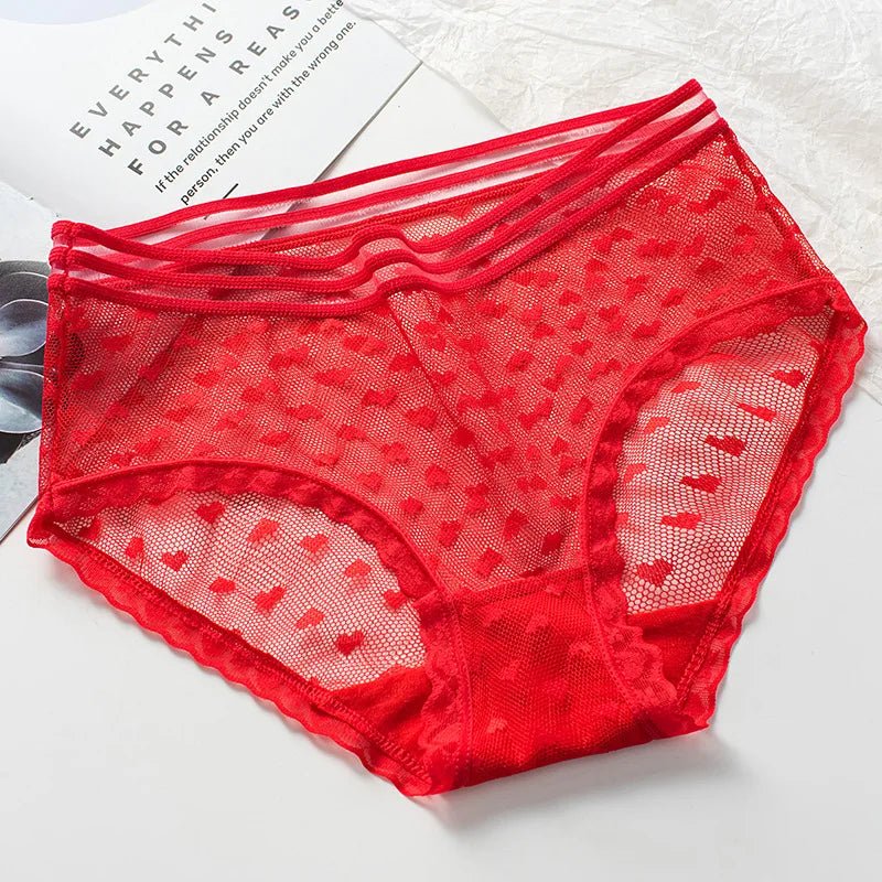 Light pink lace summer women's underwear briefs with floral pattern, showcasing delicate embroidery and comfortable fit.