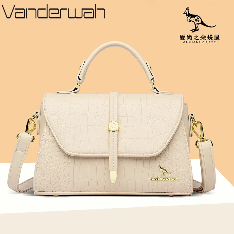 Crocodile leather crossbody bag from 2024 collection by Corporación Turística, featuring sleek design and adjustable strap.