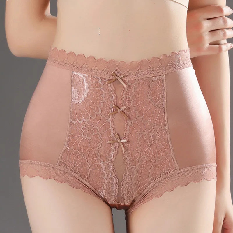 High-waisted lace women's panties from Corporación Turística, featuring elastic fabric and intricate lace detailing.