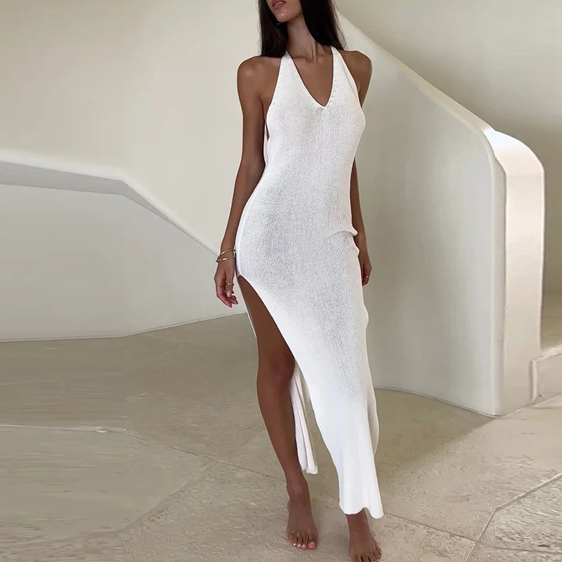 Sexy women's dress with V-neckline and side slit, featuring a stylish design by Corporación Turística.