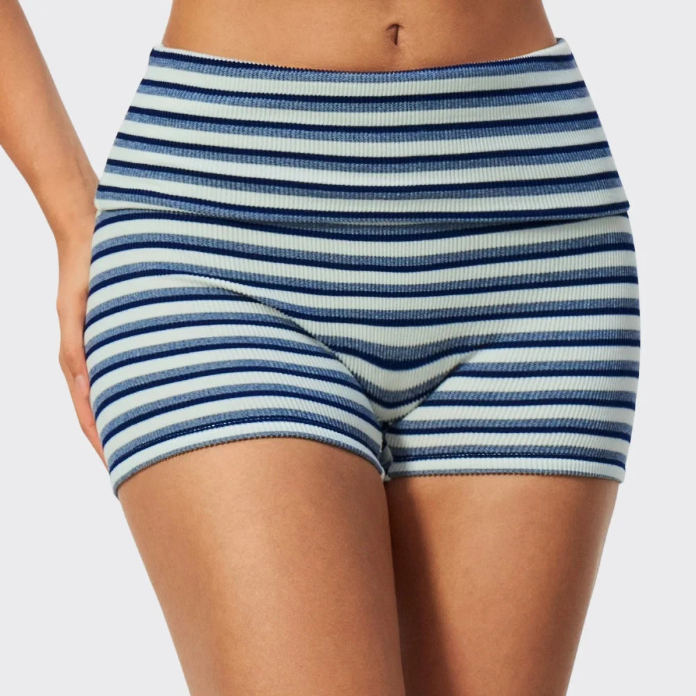 Striped ribbed yoga shorts from Corporación Turística featuring a comfortable fit for active wear.