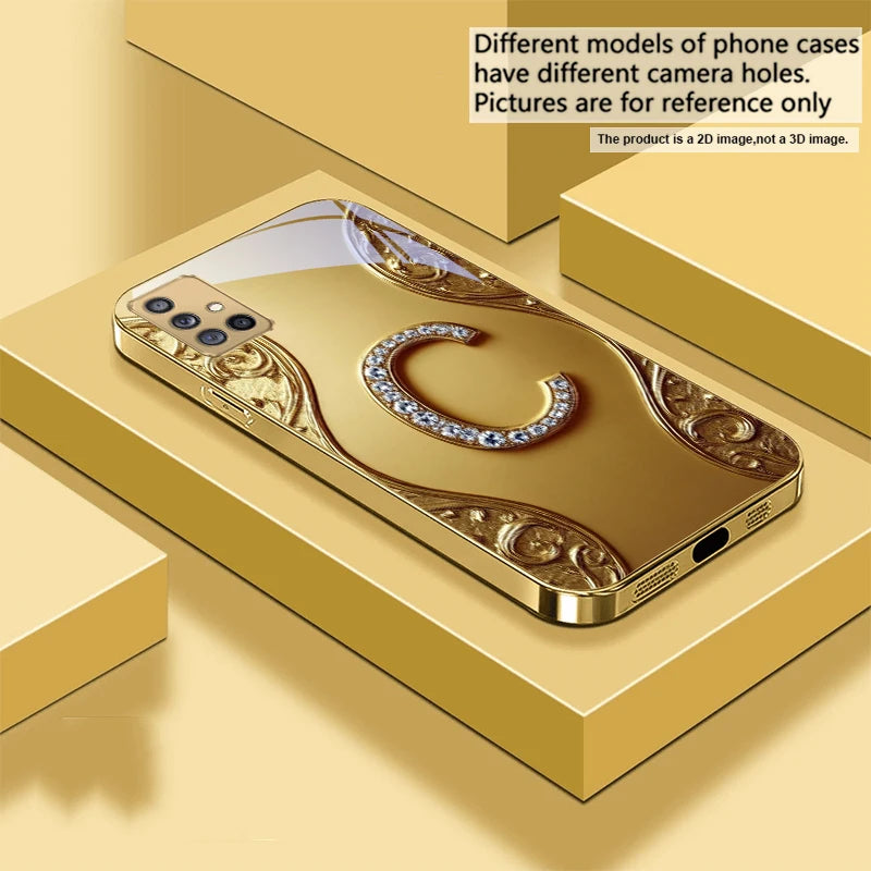 Golden crystal phone case with diamond accents, designed for a stylish and protective look on mobile devices.