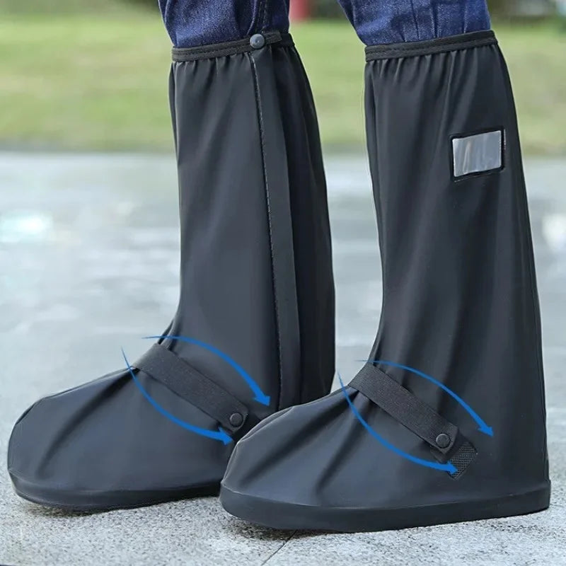 High waterproof black rubber boot covers, tall rain shoe protectors from Corporación Turística, designed for wet weather.