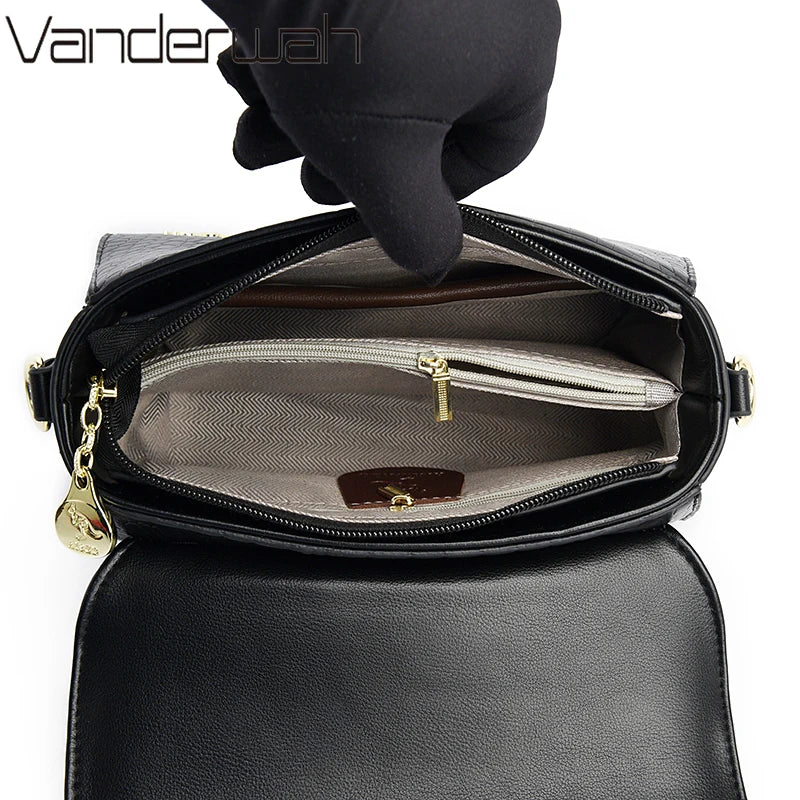 Crocodile leather crossbody bag by Corporación Turística, stylish 2024 design with sleek black finish and adjustable strap.