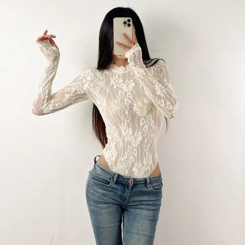 Women's long-sleeve body with mid-high neckline by Corporación Turística, shown in a close-up of the front view.