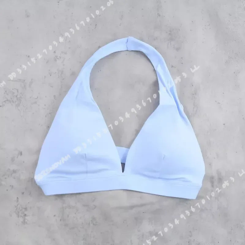 Sujetador deportivo para mujer con diseño de cuello halte...