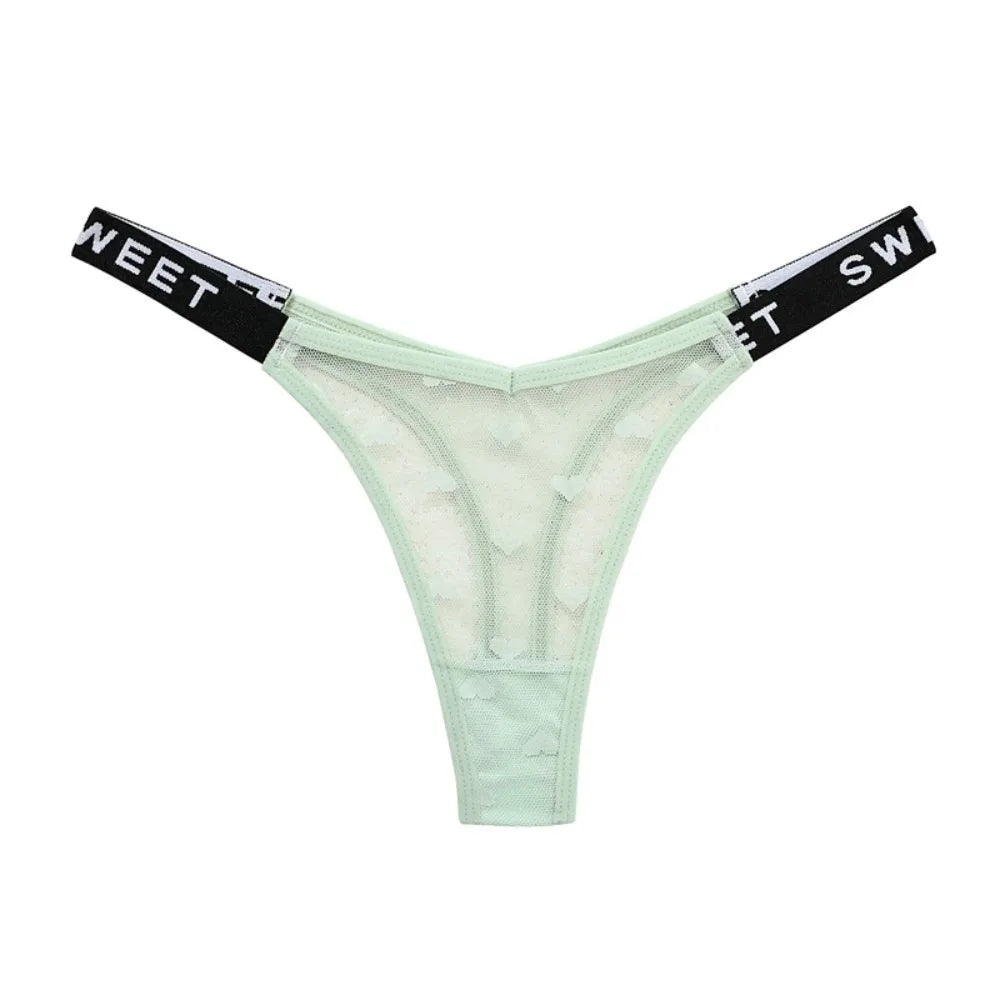 Cotton thong underwear with heart mesh design, seamless fit from Corporación Turística.