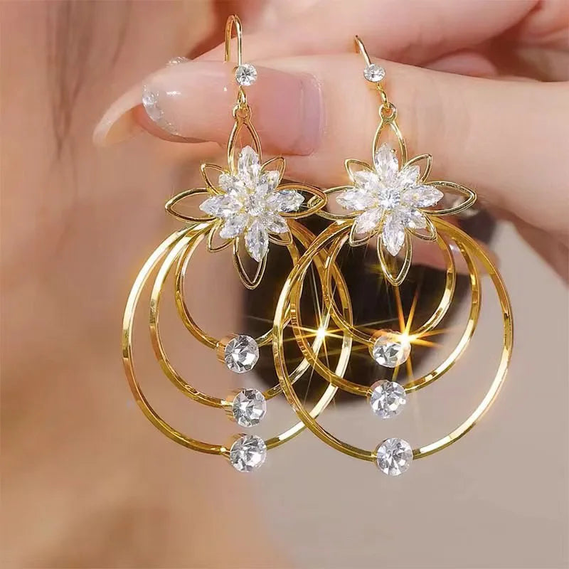 Pendientes exquisitos circulares de flores con personalid...