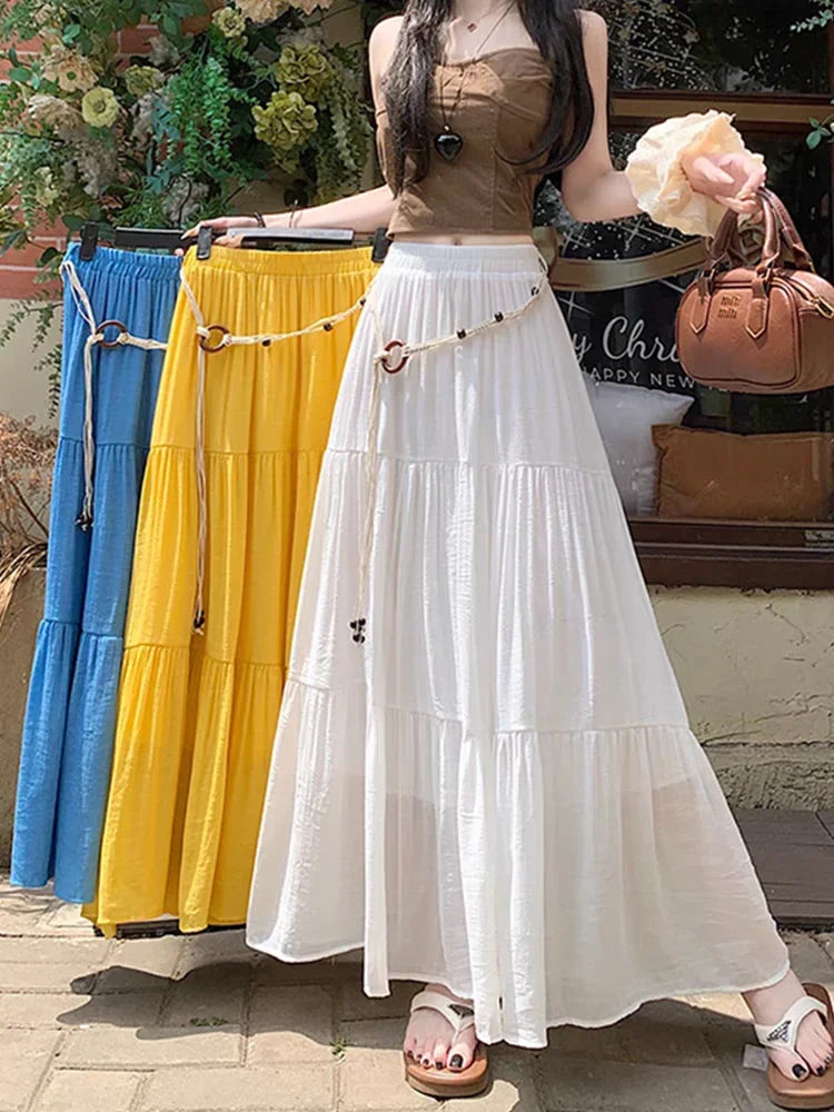 Long boho midi skirt made of cotton and linen, perfect for summer, featuring a flowing, casual design.