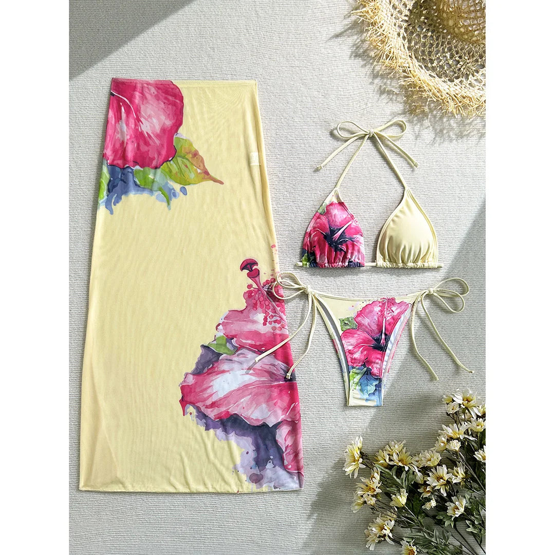 Colorful floral bikini with matching skirt, women's swimwear by Corporación Turística, perfect for beach or poolside wear.