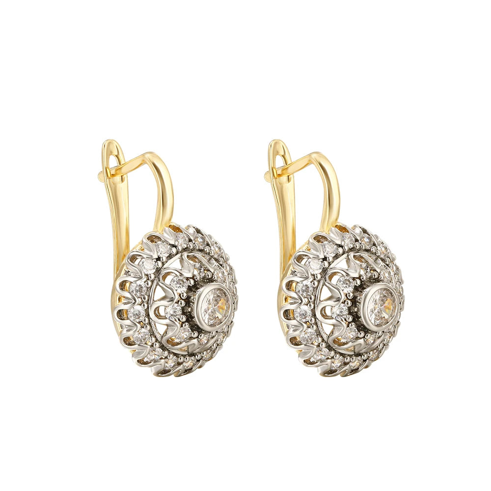 Vermiculite earrings with cone inlays from Corporación Turística, close-up view of the jewelry's textured surface and intricate design.