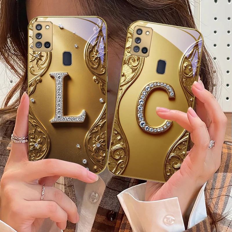 Golden crystal phone case with diamond accents, designed for elegance and protection, by Corporación Turística.