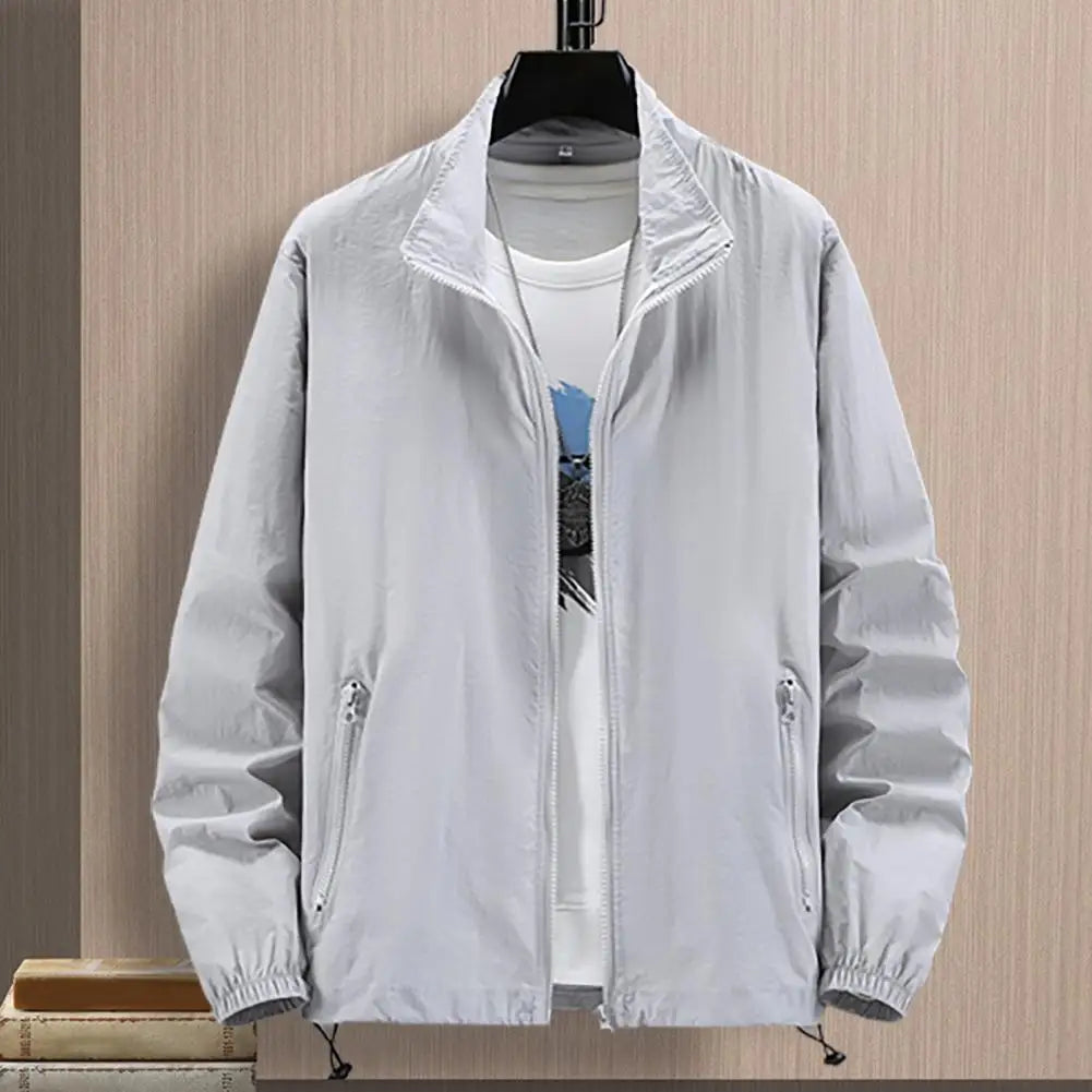 Men's outdoor jacket by Corporación Turística with protective features, shown in a stylish design suitable for outdoor wear.