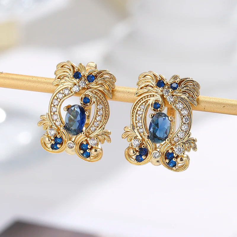 Elegant blue cubic zirconia earrings from Corporación Turística, featuring sparkling gemstone accents and a stylish design.