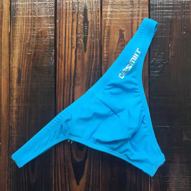 Colorful wholesale 2026 swimsuit collection by Corporación Turística featuring various styles and vibrant designs.