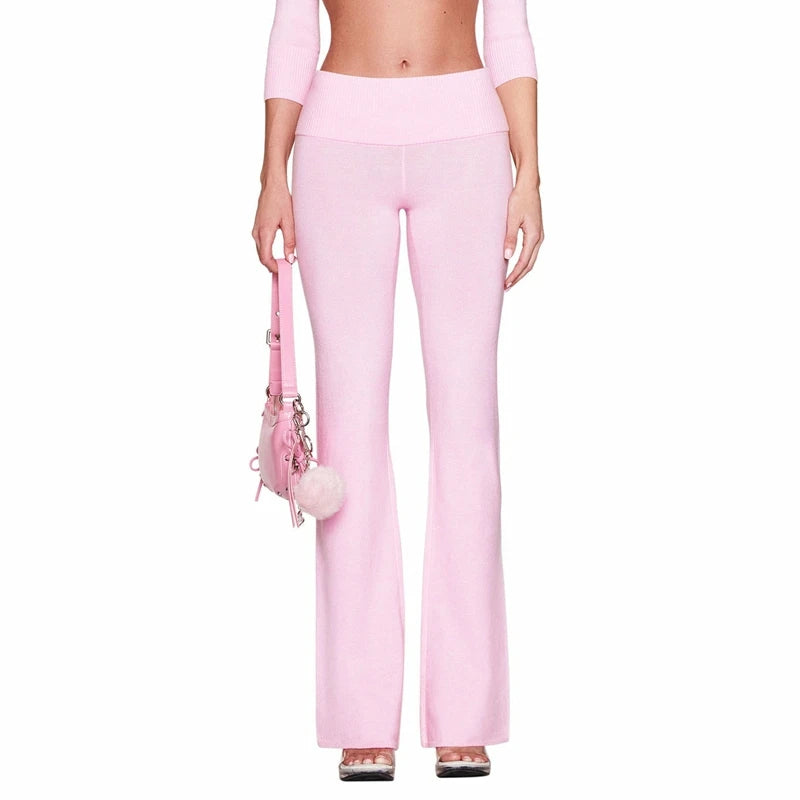 Long flared knit pants from Combhasaki Y2l by Corporación Turística, shown in a stylish, comfortable fit.