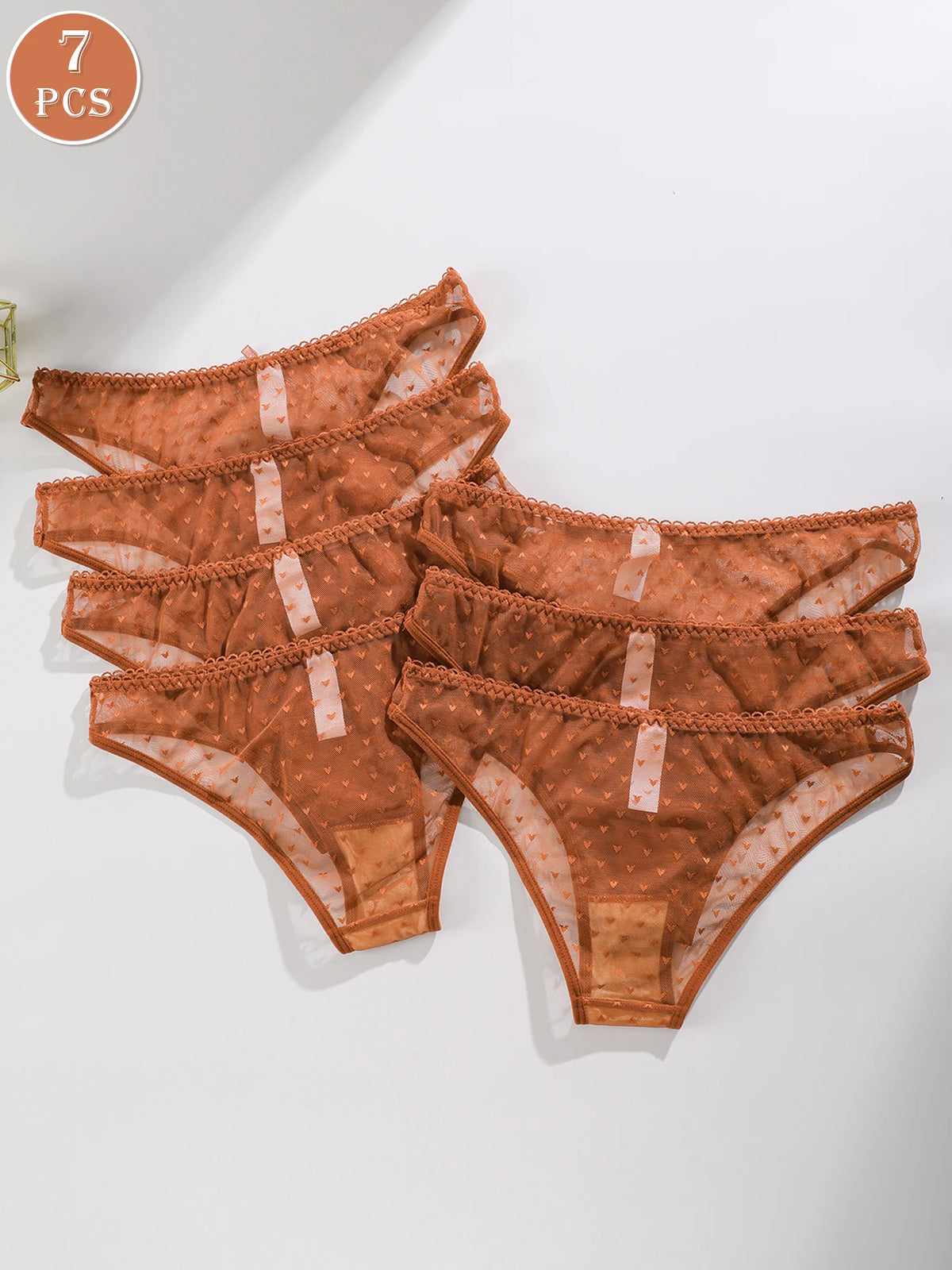 Set of seven comfortable triangular cotton underwear briefs by Corporación Turística, simple and suitable for everyday wear.