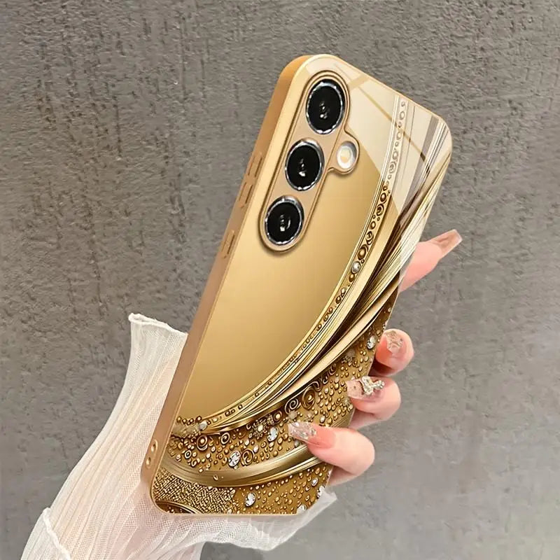 Gold-plated TPU case for Samsung Galaxy S26/S25 from Corporación Turística, showing the sleek, shiny gold finish and flexible design.