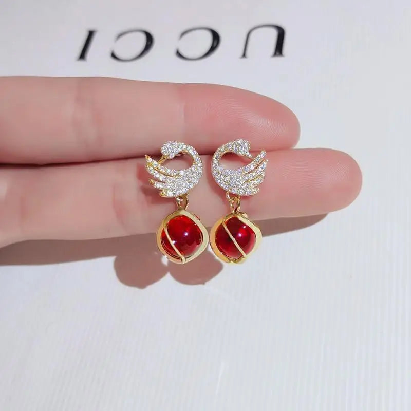 Pendientes de cisne de cristal hueco de aguja de plata 92...