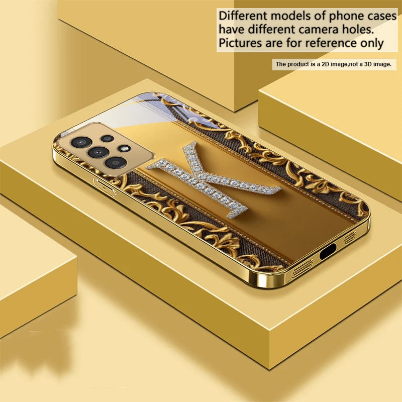 Golden crystal phone case with diamond accents, designed for a stylish look and protection for smartphones.