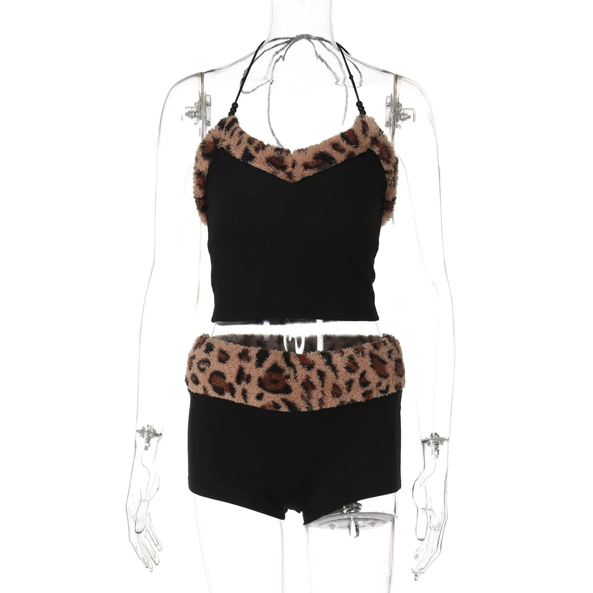 Two-piece matching set featuring a sling from Corporación Turística, perfect for casual or outdoor wear.