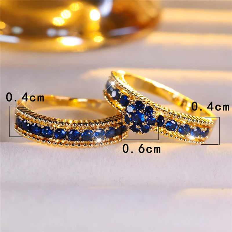 Conjunto de anillos de compromiso de piedra de circón azu...