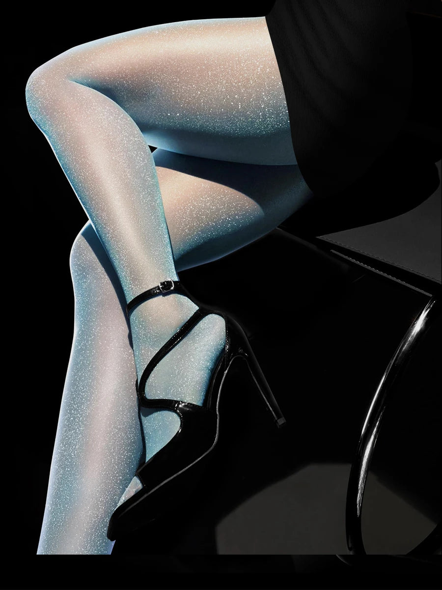 Transparent shiny and nude sexy Kave tights by Corporación Turística shown in the image.
