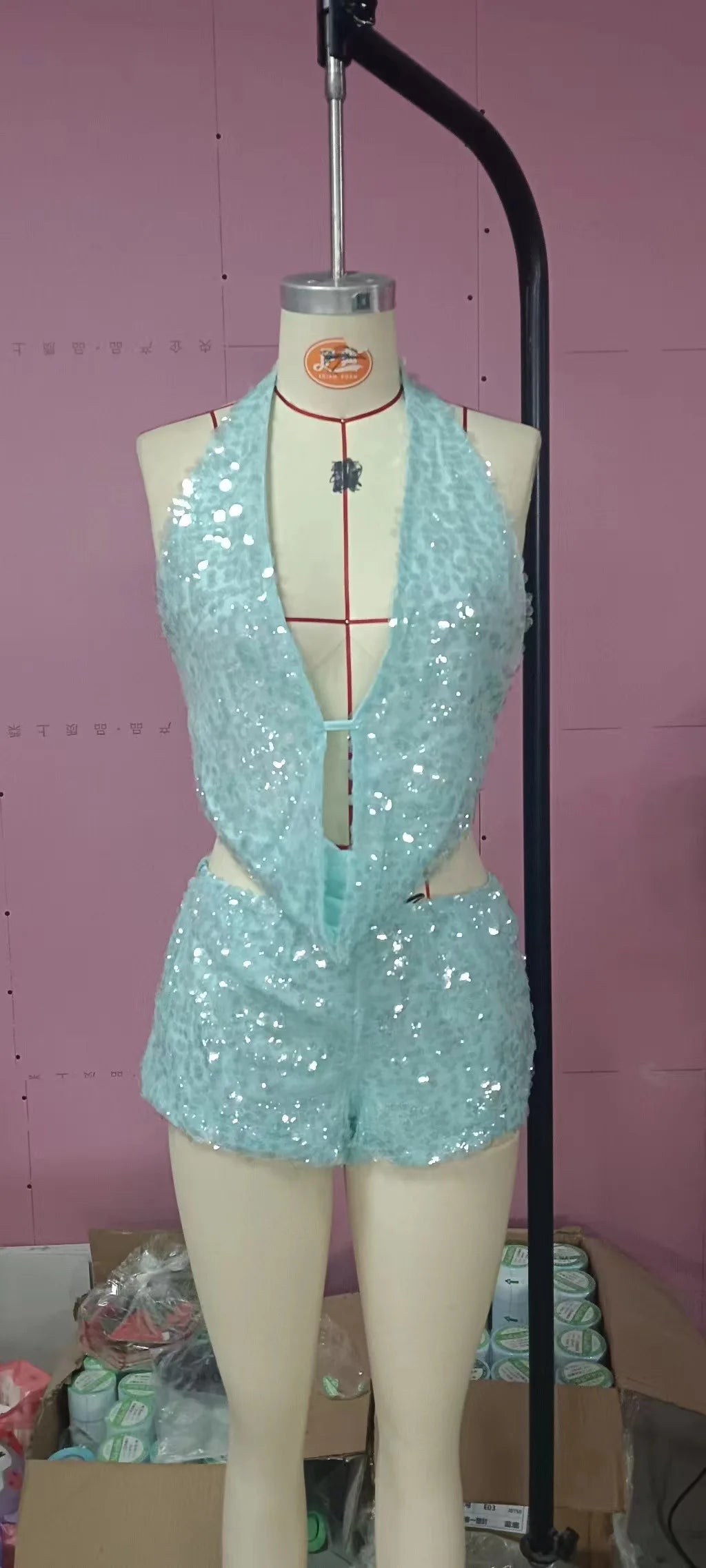Seamless two-piece sexy sequin set with sleeveless top, shiny embellishments, perfect for night out or special occasions.