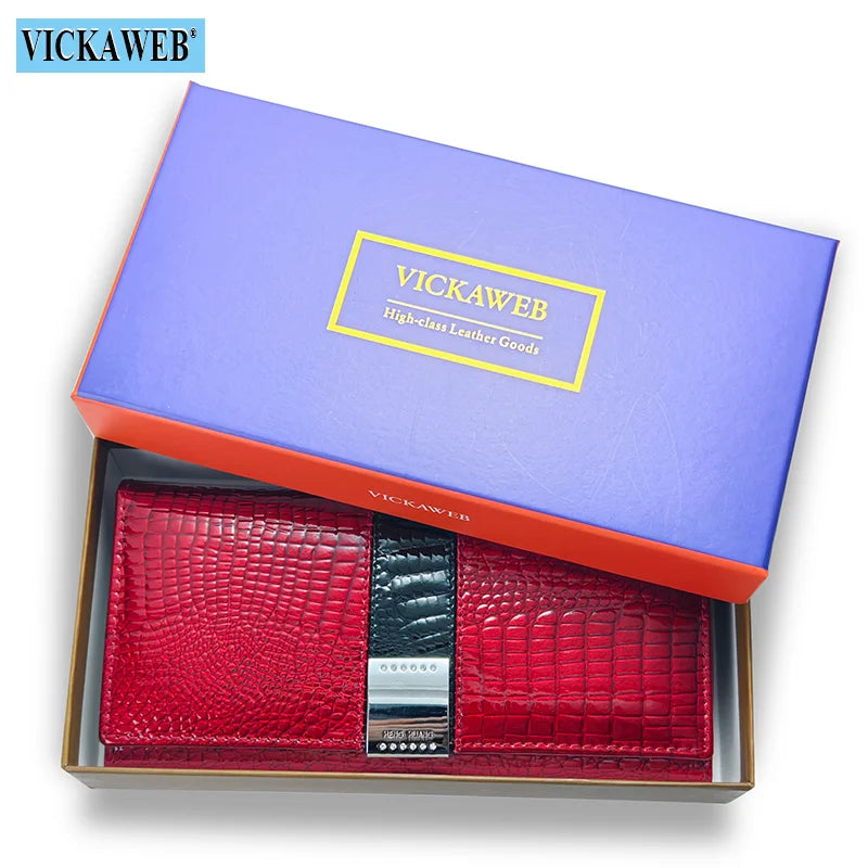 Leather long wallet by Corporación Turística with a patent finish, featuring multiple card slots and a sleek design.