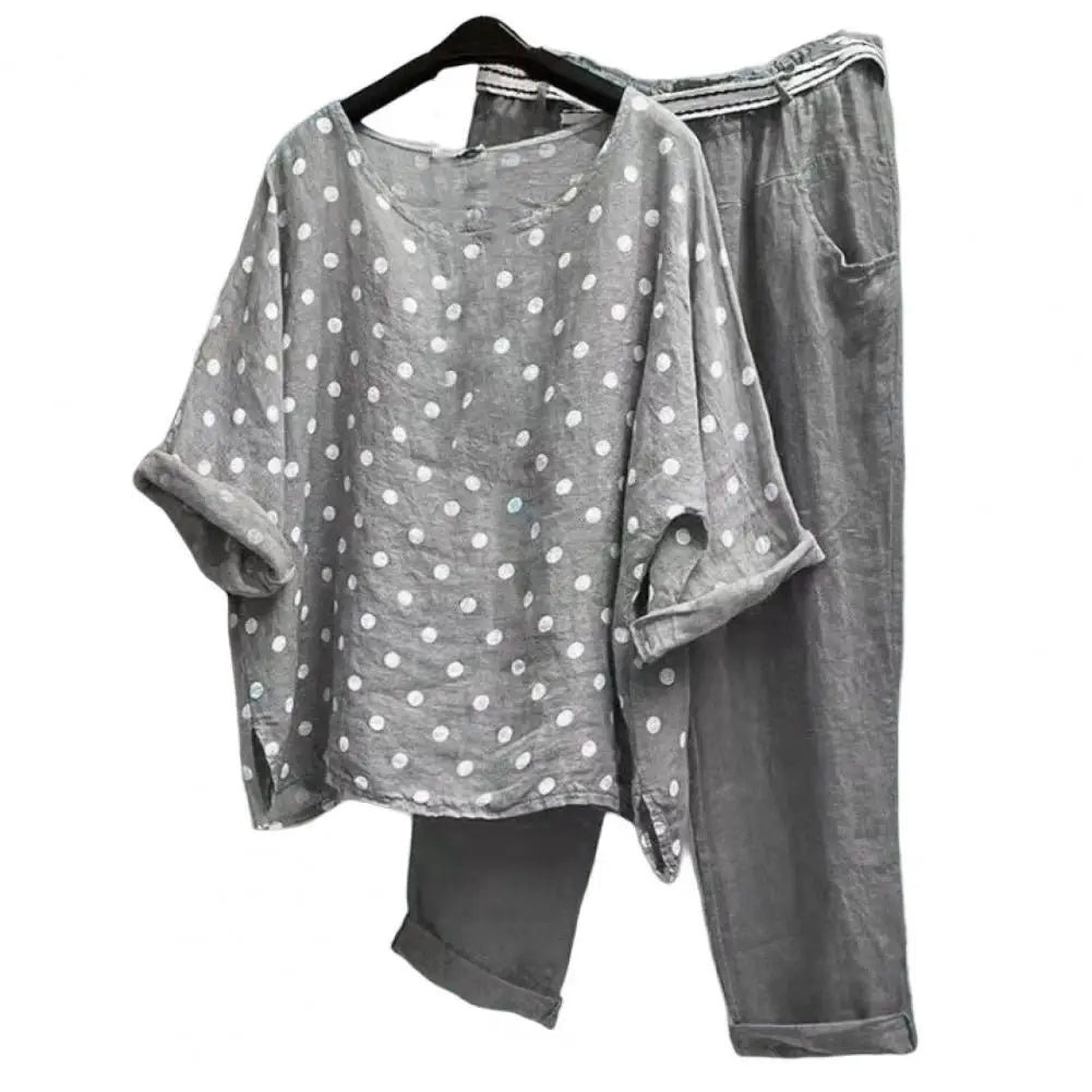 Spring and summer women's outfit with blouse and pants from Corporación Turística featuring a stylish, casual look.