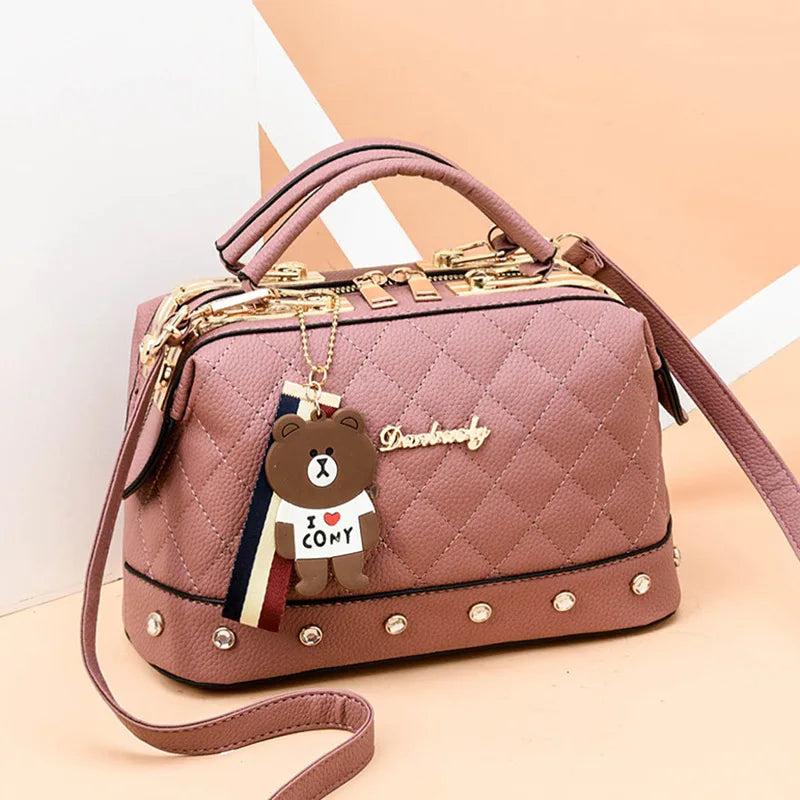 Small high-quality women's square handbag by Corporación Turística, featuring a sleek design and compact size.