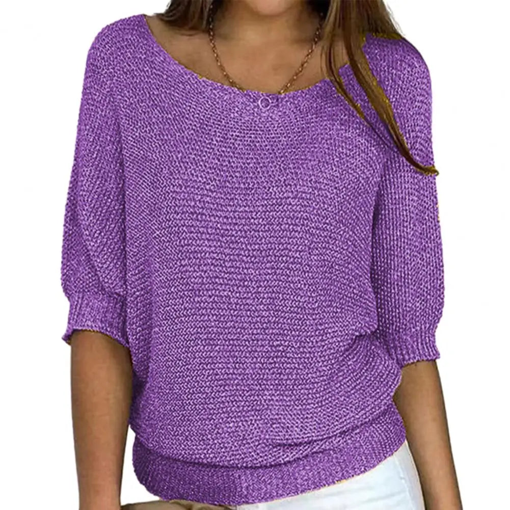 Solid color women's jersey sweater from Corporación Turística, showcasing a cozy, casual fit in a close-up shot.