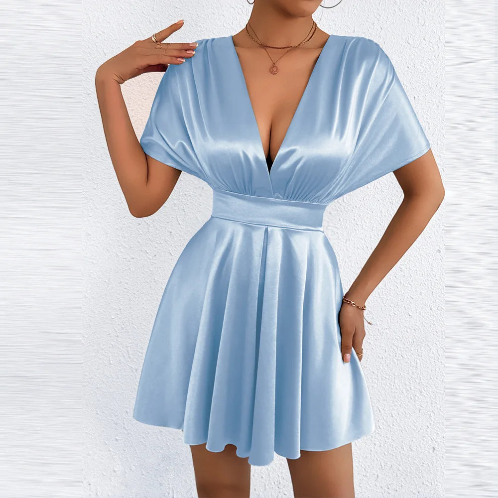 Elegant women's sexy V-neck dress with low waist from Corporación Turística, showcasing a stylish and flattering silhouette.