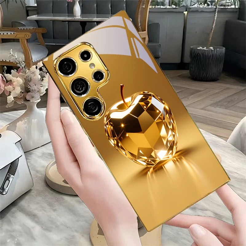 Golden phone case with a colorful fruit prism design, designed for smartphones by Corporación Turística.