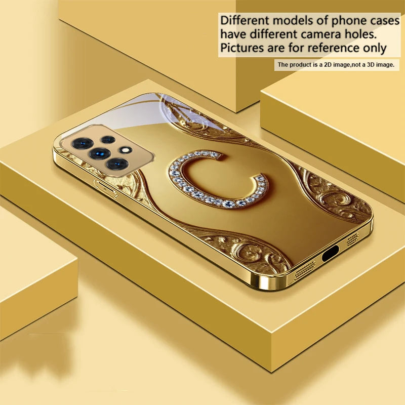 Golden crystal phone case with diamond accents, designed for a stylish and luxurious look on smartphones.