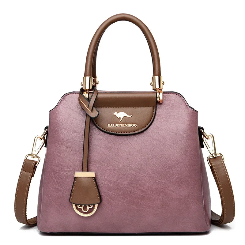 Small crossbody leather bag for women, stylish shoulder bag from Corporación Turística, with adjustable strap and compact design.